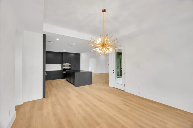 a view of a hallway with staircase