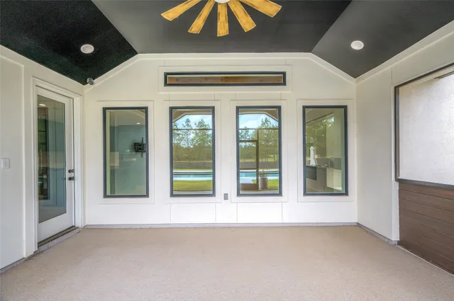 a kitchen with stainless steel appliances granite countertop a stove and a microwave