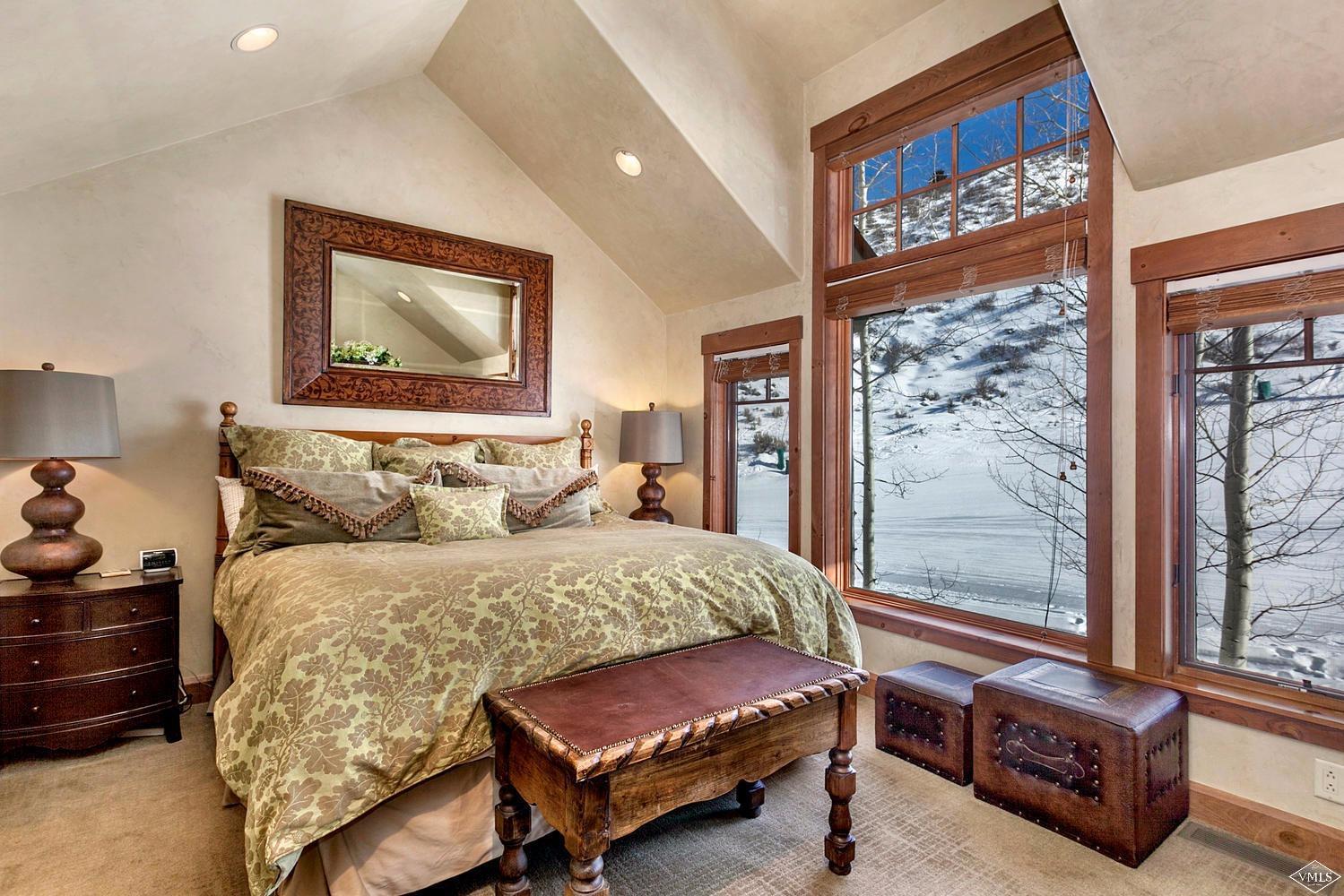 348 Cresta Road Edwards, CO 81632 - Photo 12 of 25 a bedroom with a bed and a window