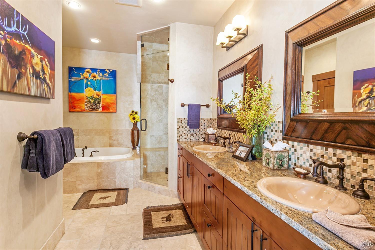 348 Cresta Road Edwards, CO 81632 - Photo 14 of 25 a bathroom with a sink double vanity