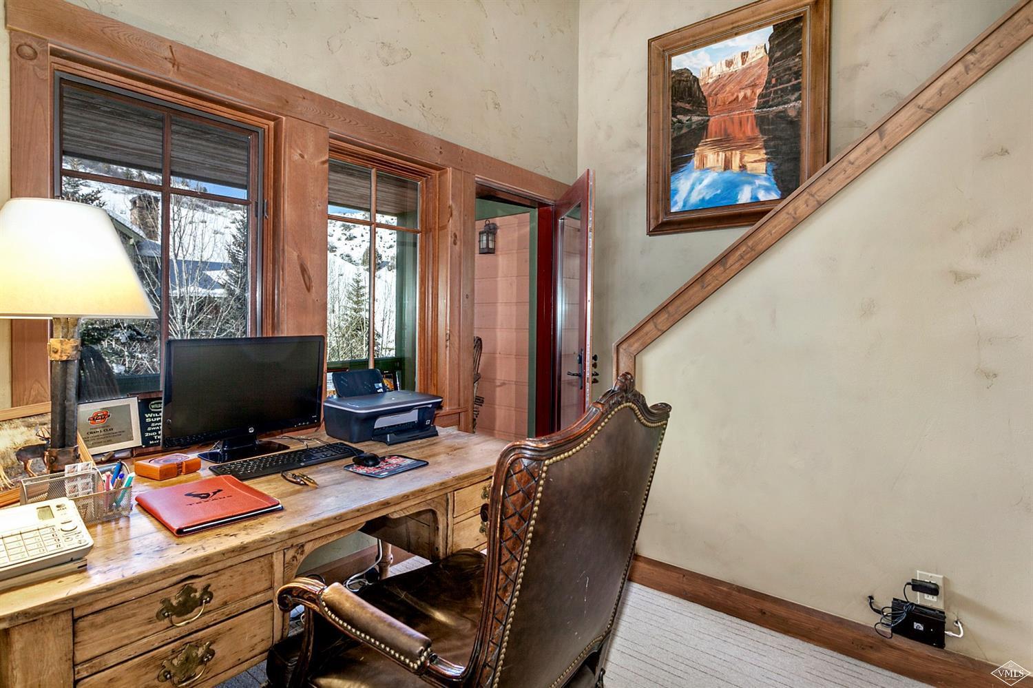 348 Cresta Road Edwards, CO 81632 - Photo 15 of 25 a view of a workspace with furniture and a window