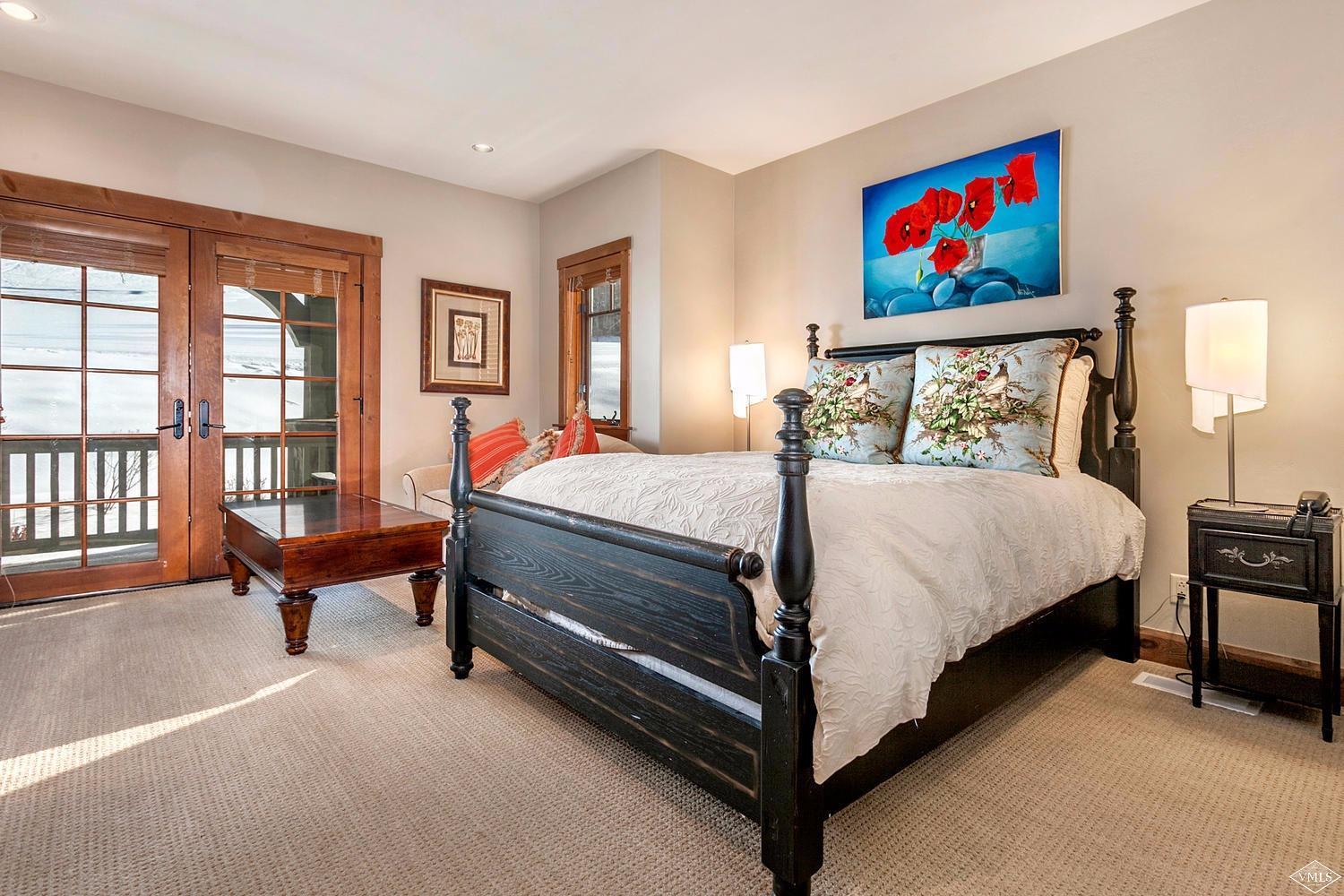 348 Cresta Road Edwards, CO 81632 - Photo 17 of 25 a bedroom with a bed and a couch