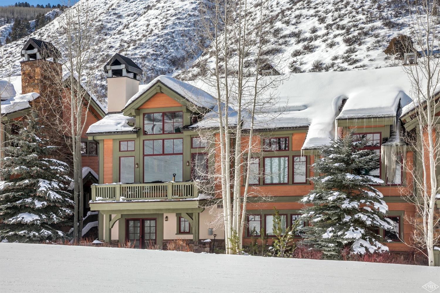 348 Cresta Road Edwards, CO 81632 - Photo 4 of 25 a front view of a house with a yard