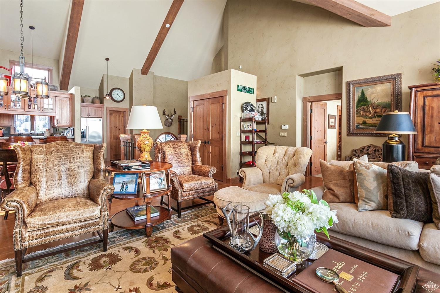 348 Cresta Road Edwards, CO 81632 - Photo 7 of 25 a living room with furniture and wooden floor