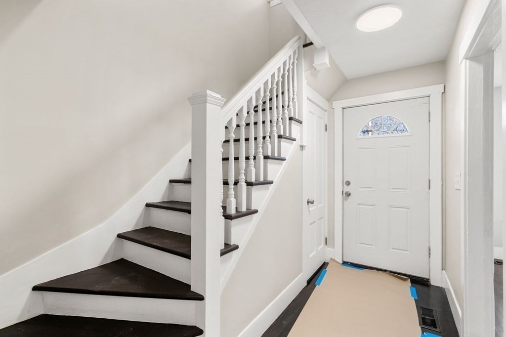 35-41 Watch Street Rochdale, MA 01542 - Photo 25 of 42 a view of entryway with stairs and wooden floor