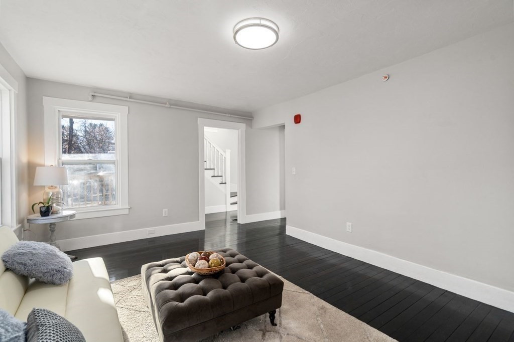 35-41 Watch Street Rochdale, MA 01542 - Photo 32 of 42 a bedroom with furniture and a window