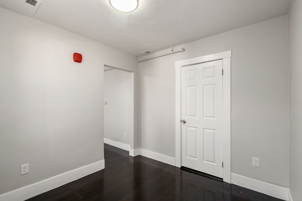 35-41 Watch Street Rochdale, MA 01542 - Photo 33 of 42 an empty room with wooden floor