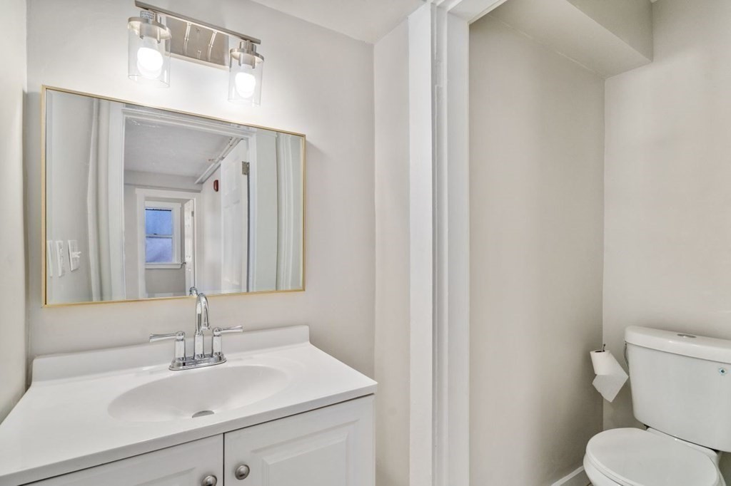 35-41 Watch Street Rochdale, MA 01542 - Photo 37 of 42 a bathroom with a sink and a toilet