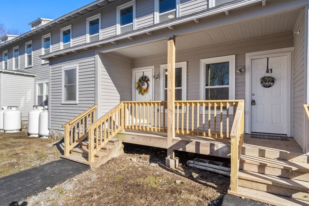 35-41 Watch Street Rochdale, MA 01542 - Photo 41 of 42 a view of a house with a wooden deck