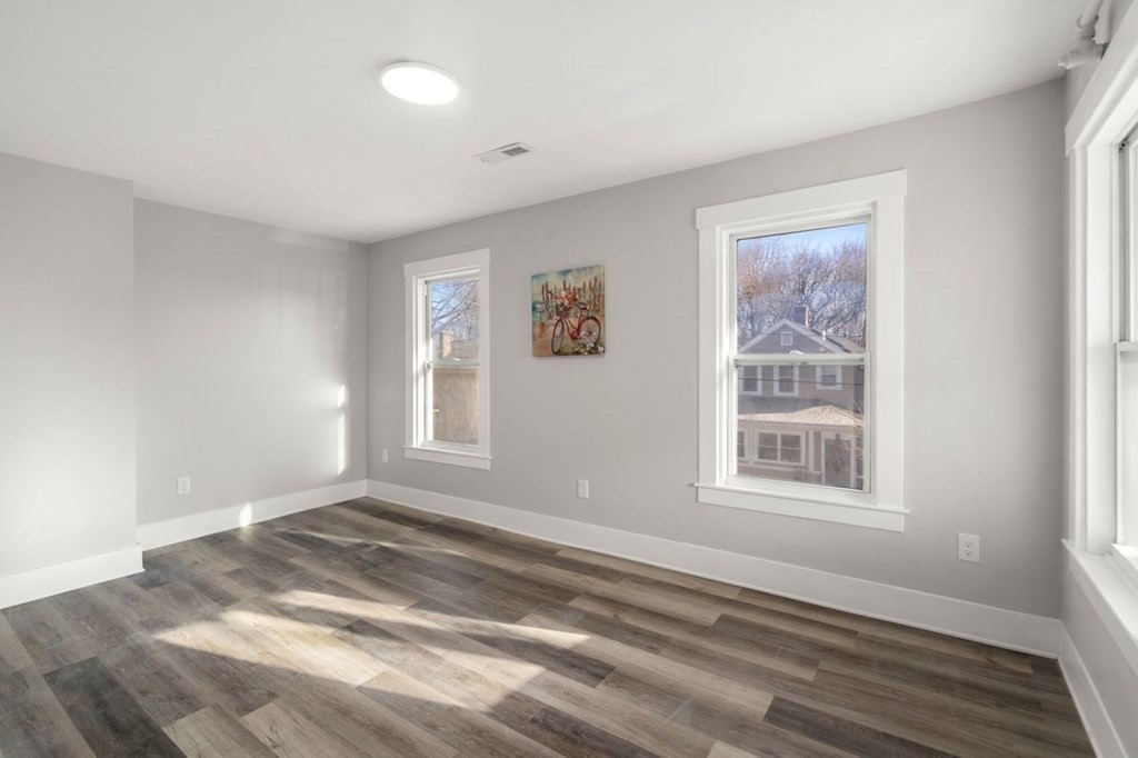 35-41 Watch Street Rochdale, MA 01542 - Photo 9 of 42 a view of empty room with window
