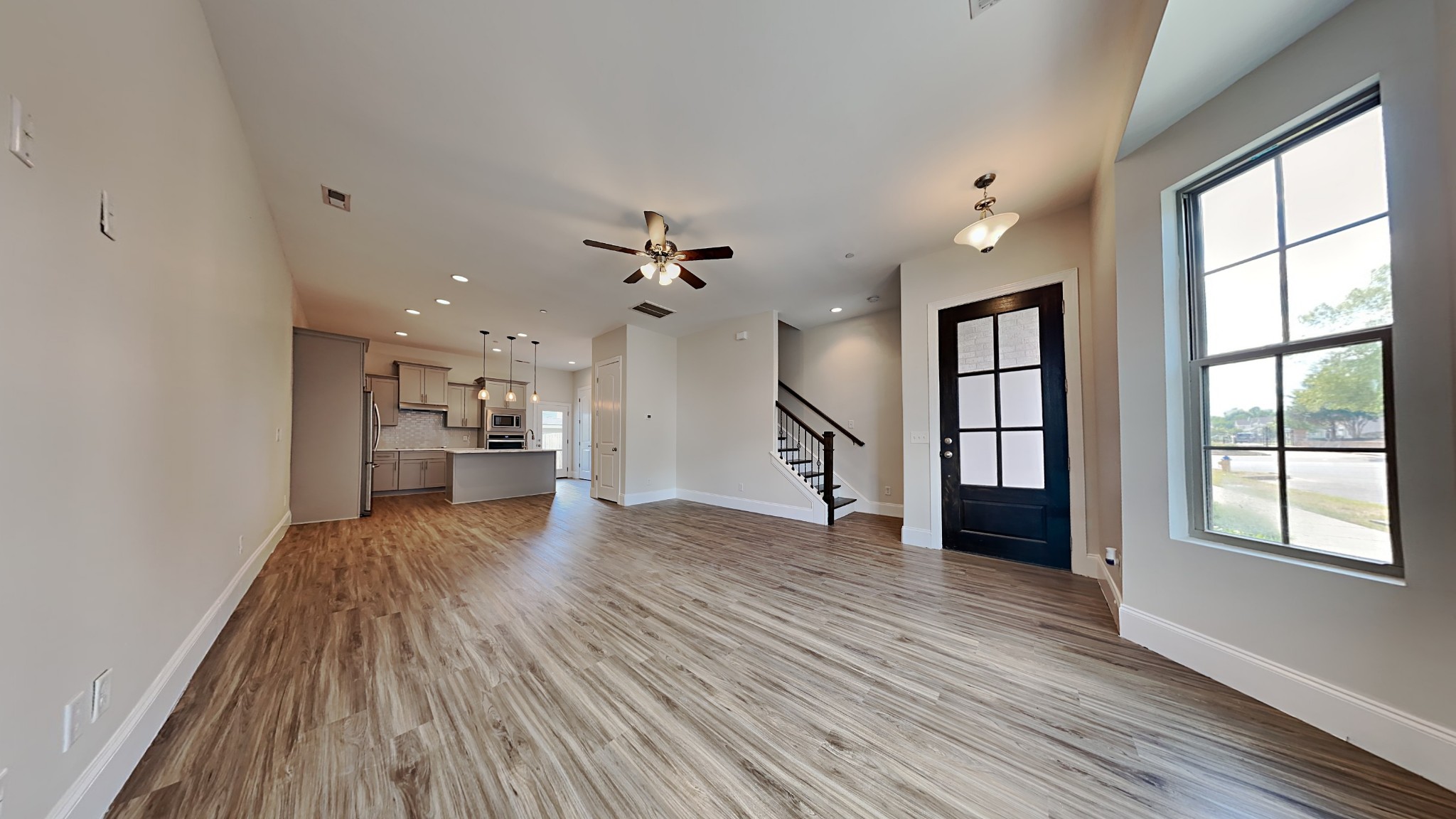 119 Savannah Avenue Pleasant View, TN 37146 - Photo 2 of 9 wooden floor in an empty room with a window