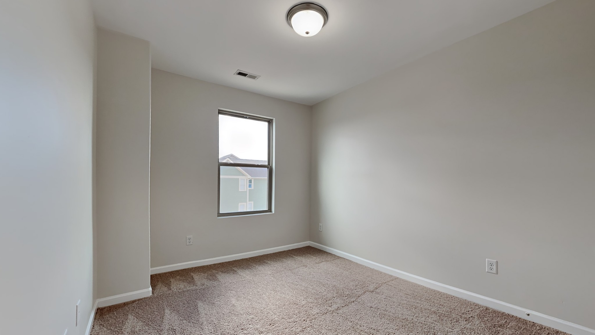119 Savannah Avenue Pleasant View, TN 37146 - Photo 5 of 9 an empty room with windows and closet