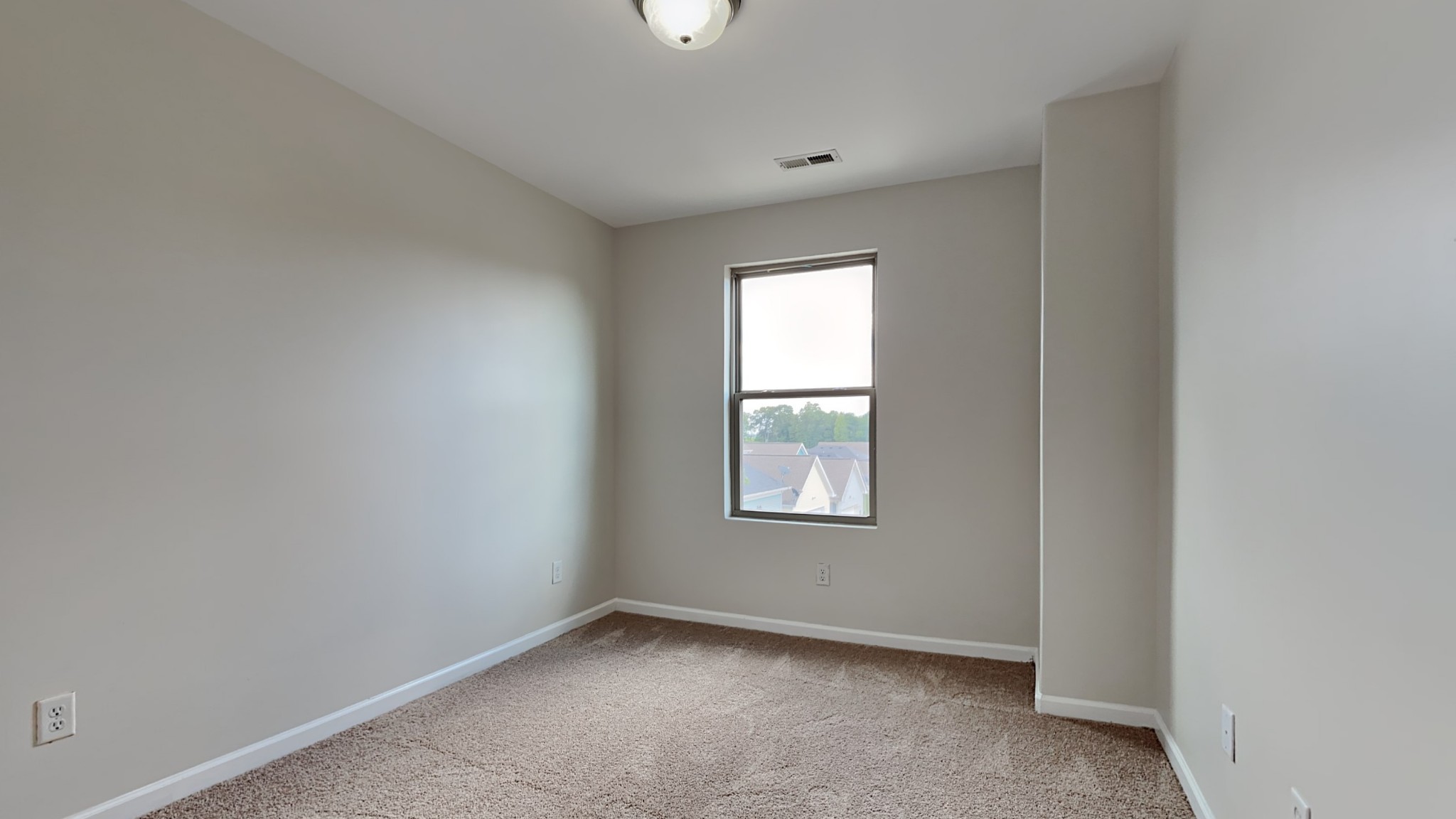 119 Savannah Avenue Pleasant View, TN 37146 - Photo 7 of 9 an empty room with windows
