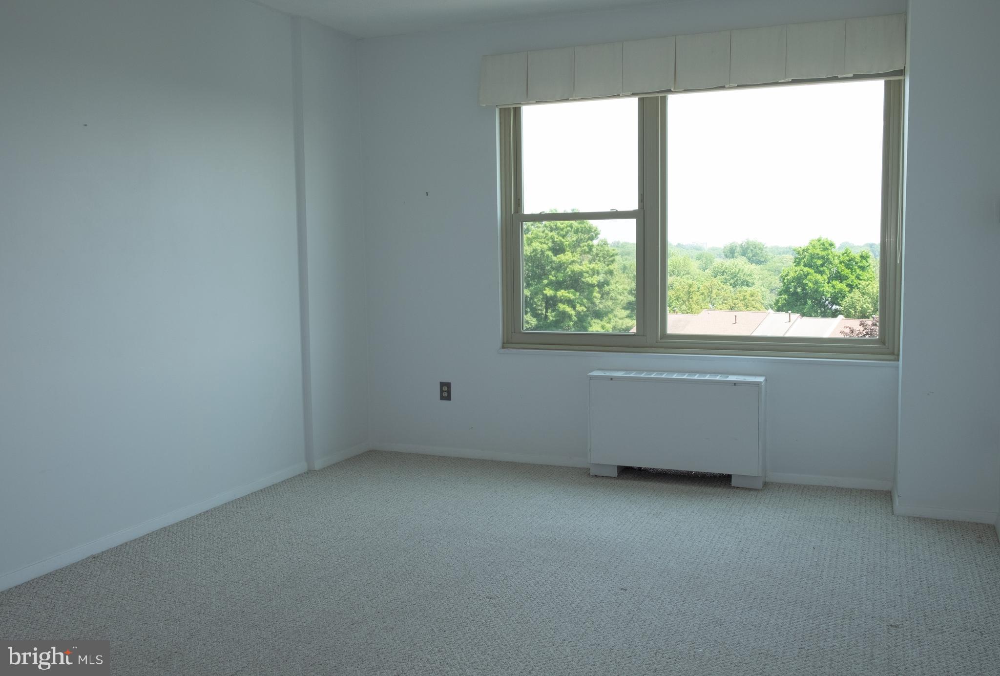 4401 Roland Avenue, Unit 601 Baltimore, MD 21210 - Photo 10 of 22 Primary bedroom