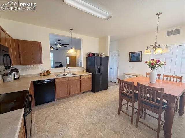 a bedroom with a bed and a table in it