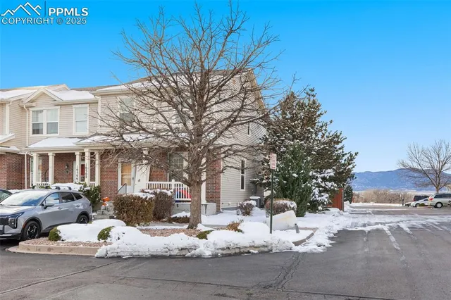 a bathroom with a sink toilet and a mirror