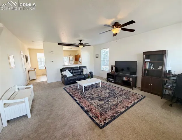 a bedroom with a bed and a night stand