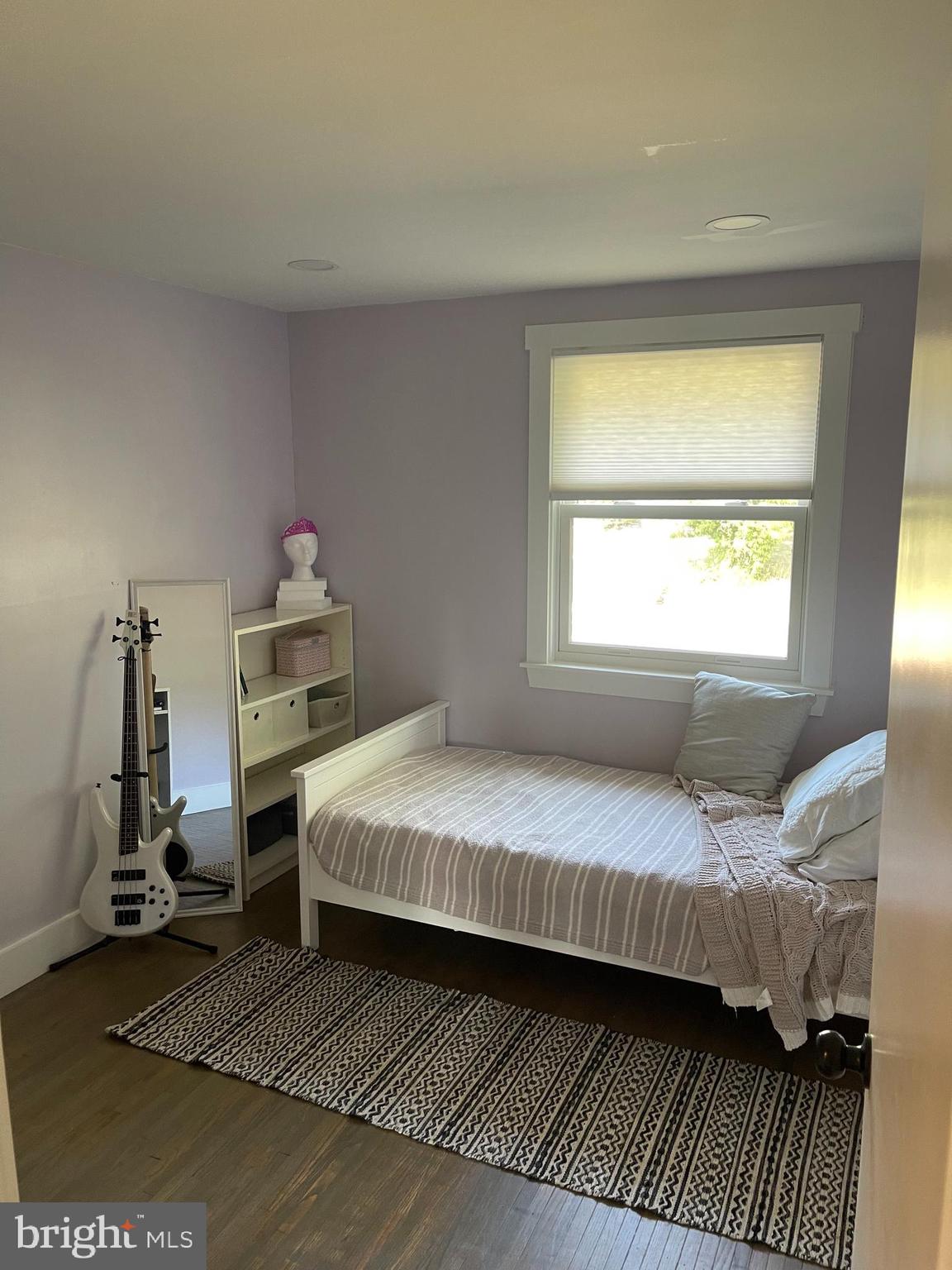 123 Newtown Road Warminster, PA 18974 - Photo 8 of 10 a bedroom with a bed and a window