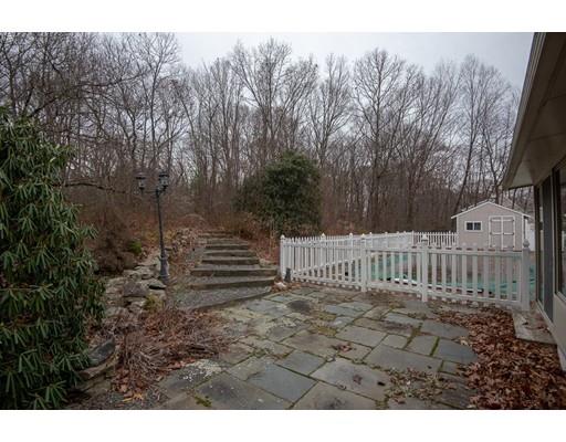 70 Dodge Road Sutton, MA 01590 - Photo 29 of 30 a view of a wooden deck with trees in the background