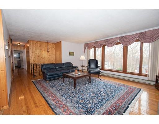 70 Dodge Road Sutton, MA 01590 - Photo 3 of 30 a living room with furniture and a rug
