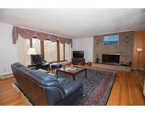 70 Dodge Road Sutton, MA 01590 - Photo 5 of 30 a living room with furniture fireplace and window