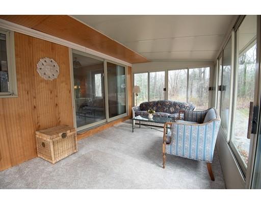 70 Dodge Road Sutton, MA 01590 - Photo 7 of 30 a living room with furniture a window and a glass door