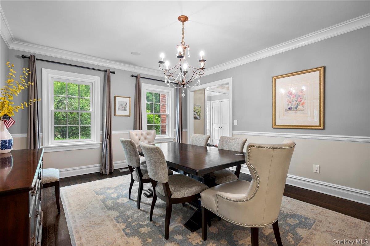 7 Harcourt Road Scarsdale, NY 10583 - Photo 10 of 34 a view of a dining room with furniture window and outside view