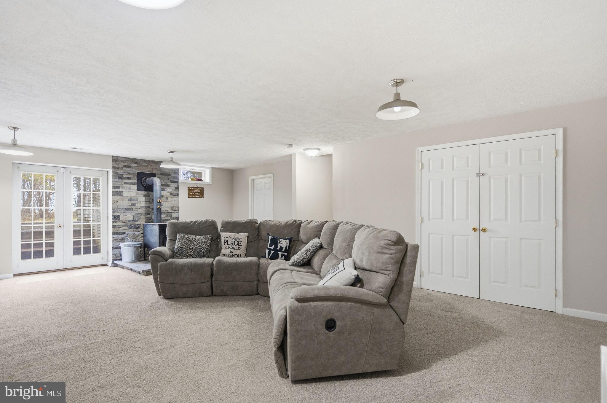 4624 Strasburg Road Strasburg, VA 22657 - Photo 27 of 31 a living room with furniture and a window
