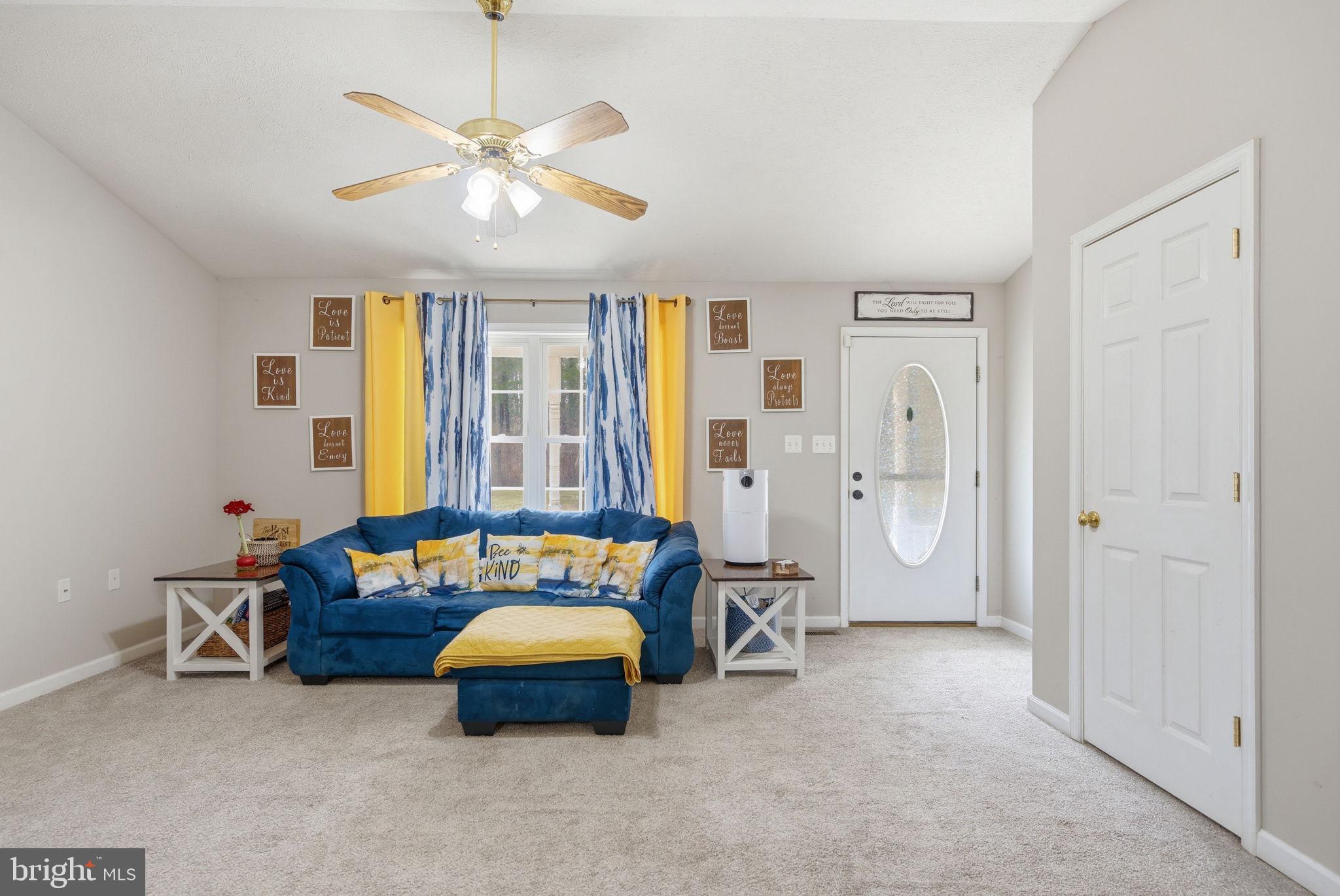 4624 Strasburg Road Strasburg, VA 22657 - Photo 4 of 31 a bedroom with furniture and a chandelier