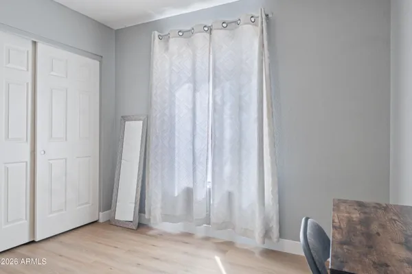 a view of a bathroom with a shower curtain