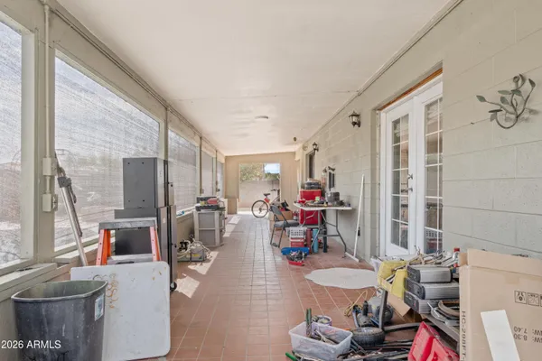 a very nice looking living room with furniture and a large window