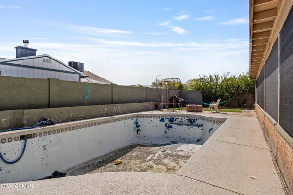 a view of roof deck with furniture