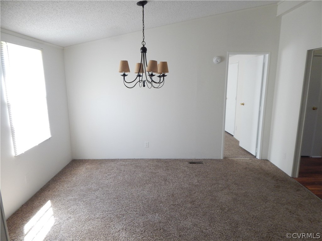 5733 Broad St Road Kents Store, VA 23084 - Photo 8 of 21 a view of an empty room with a window