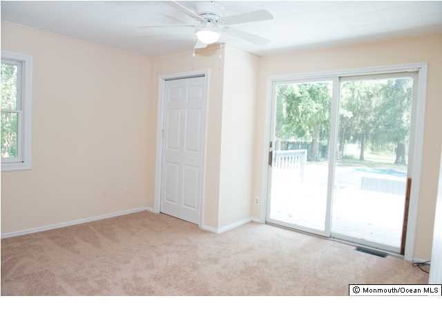 254 Lanes Pond Road Howell, NJ 07731 - Photo 14 of 16 a room with a window and a living room