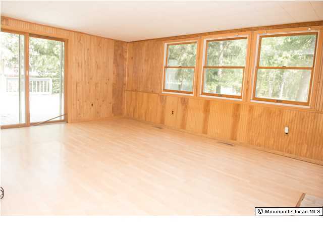 254 Lanes Pond Road Howell, NJ 07731 - Photo 9 of 16 a view of an empty room with a window