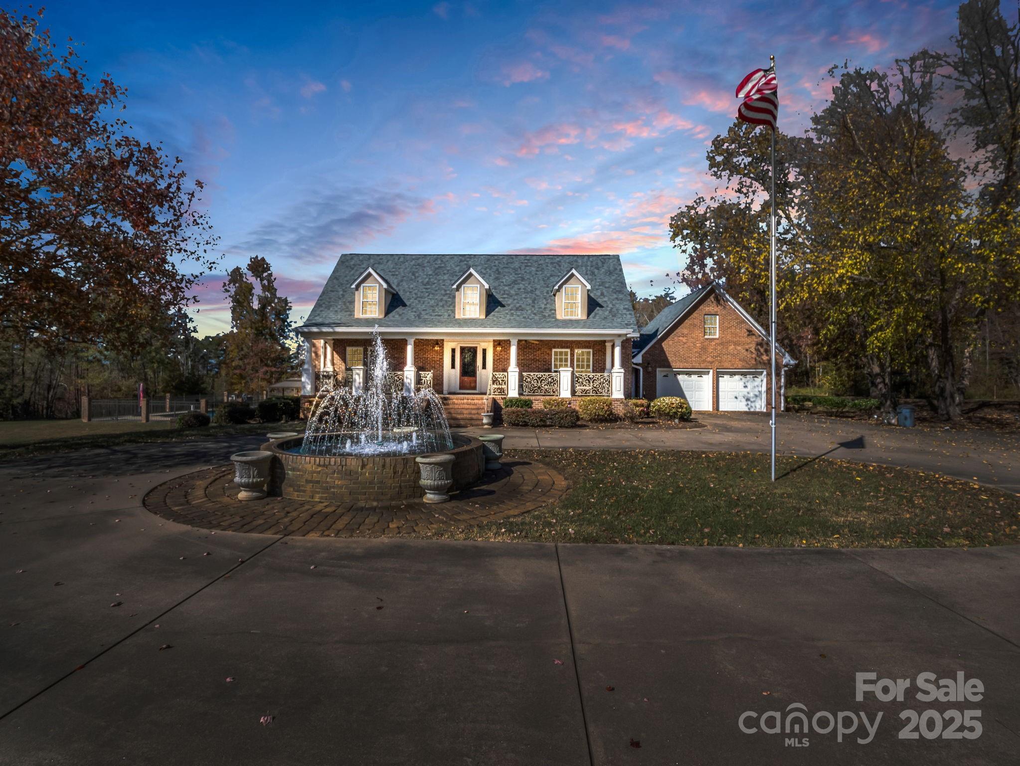 a front view of house with yard green space and yard