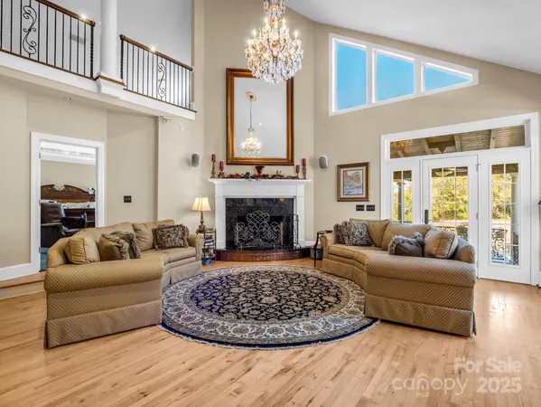 a bedroom with furniture and a fireplace