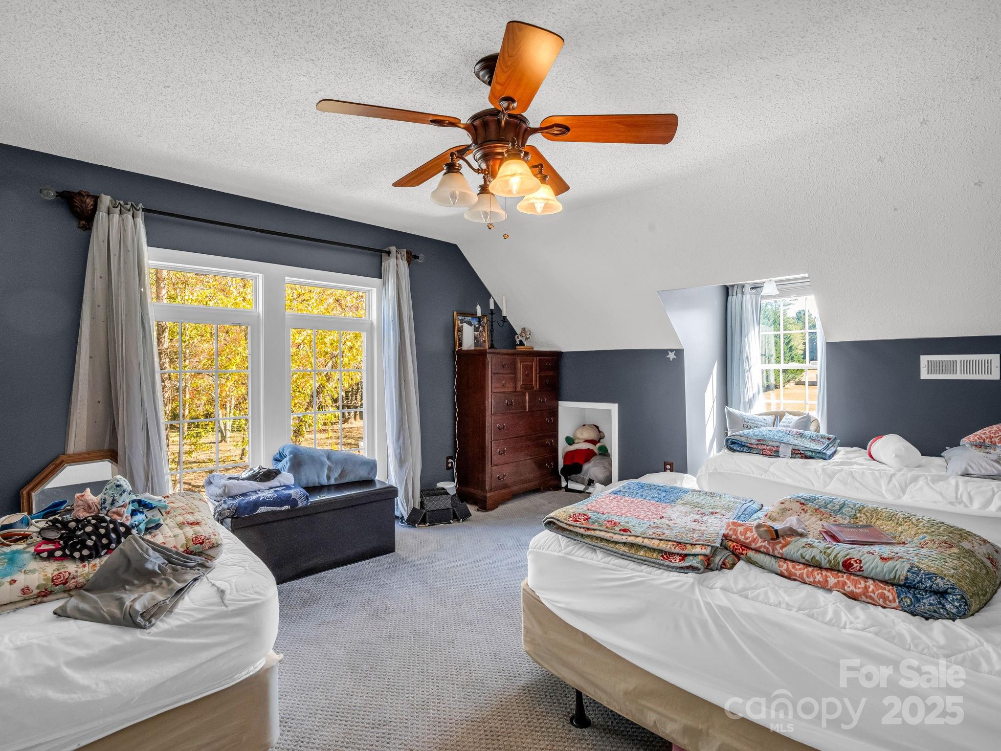 1102 South Mountain Road Bostic, NC 28018 - Photo 33 of 48 a bedroom with a bed couch and window