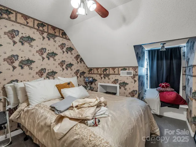 a patio with glass top table and chairs