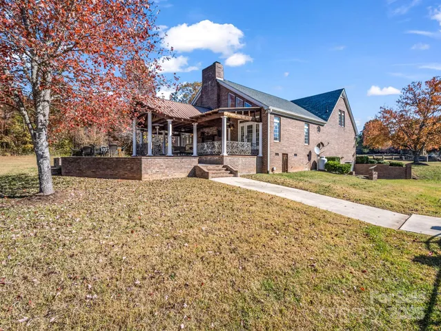 a view of outdoor space with wooden floor