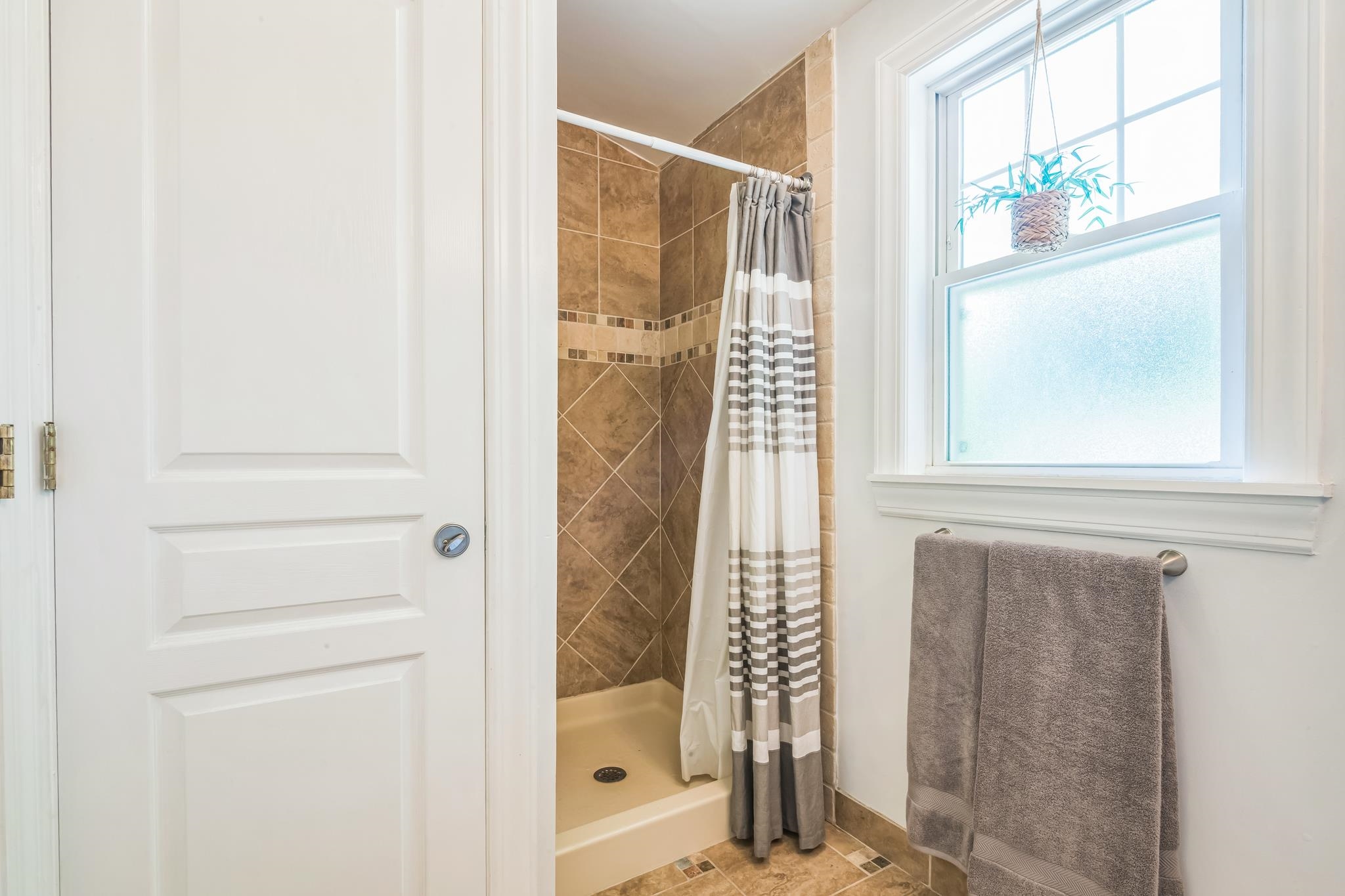 25 Shore Somers Point, NJ 08244 - Photo 13 of 35 a bathroom with a glass shower door