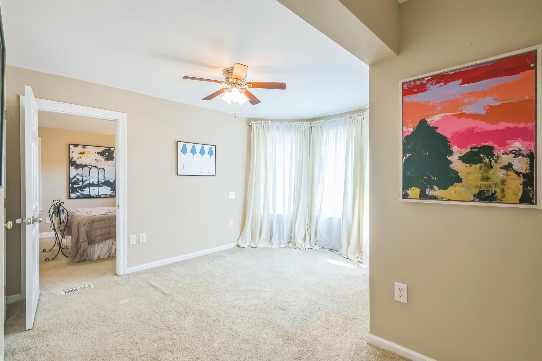 25 Shore Somers Point, NJ 08244 - Photo 19 of 35 a view of a livingroom with wooden floor and a ceiling fan