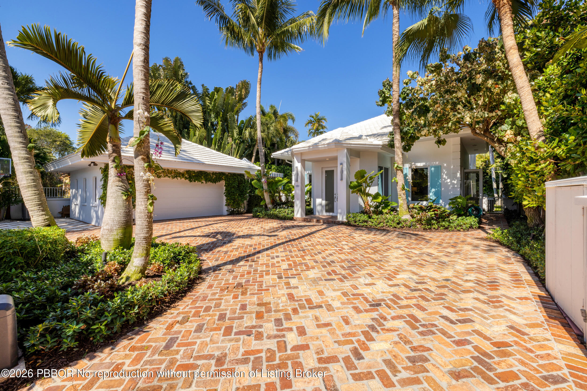 121 Seville Road West Palm Beach, FL 33405 - Photo 3 of 67 a front view of a house with a yard