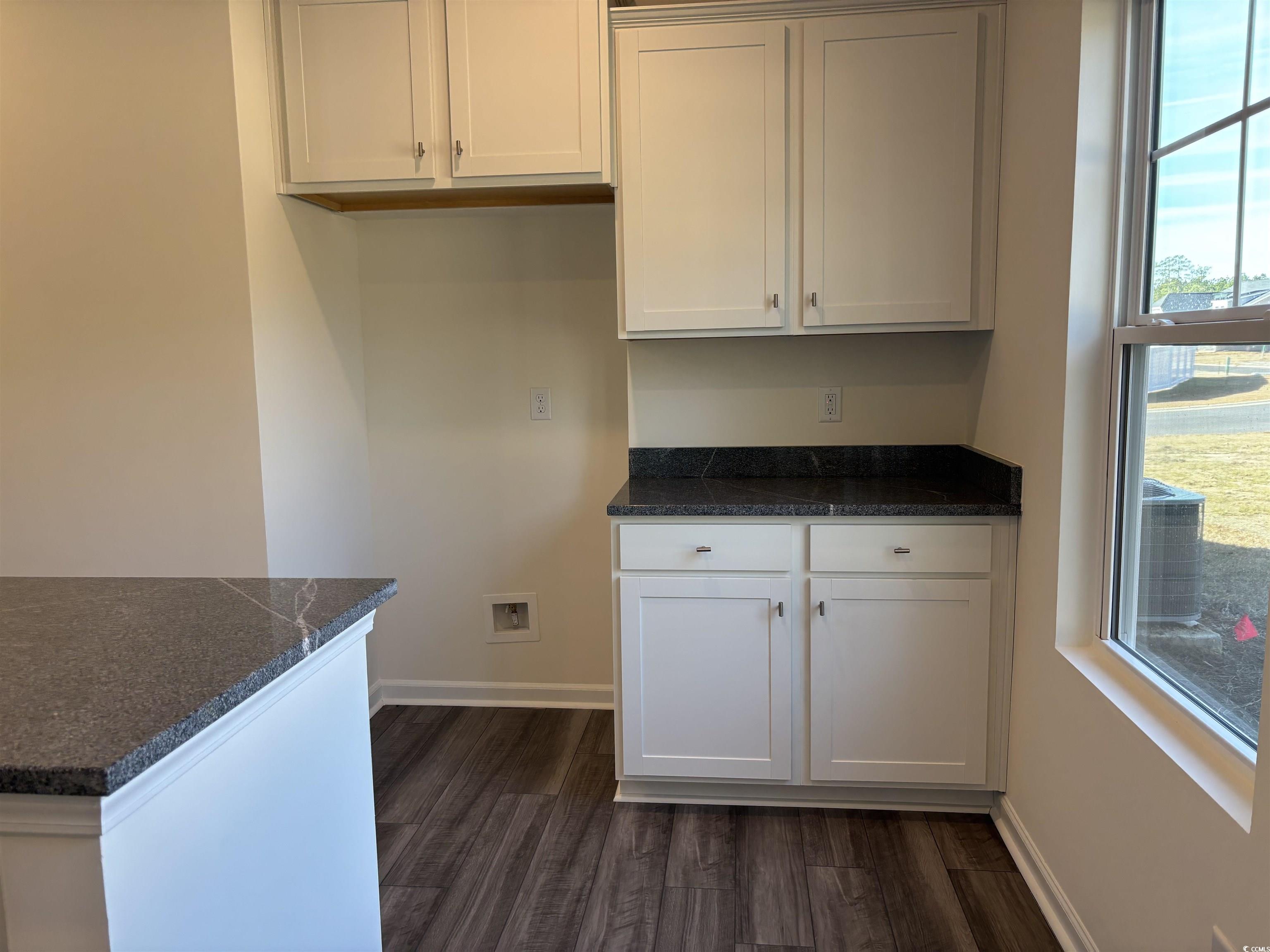 216 Palmetto Sand Loop Conway, SC 29527 - Photo 16 of 38 Kitchen featuring dark stone countertops, white ca