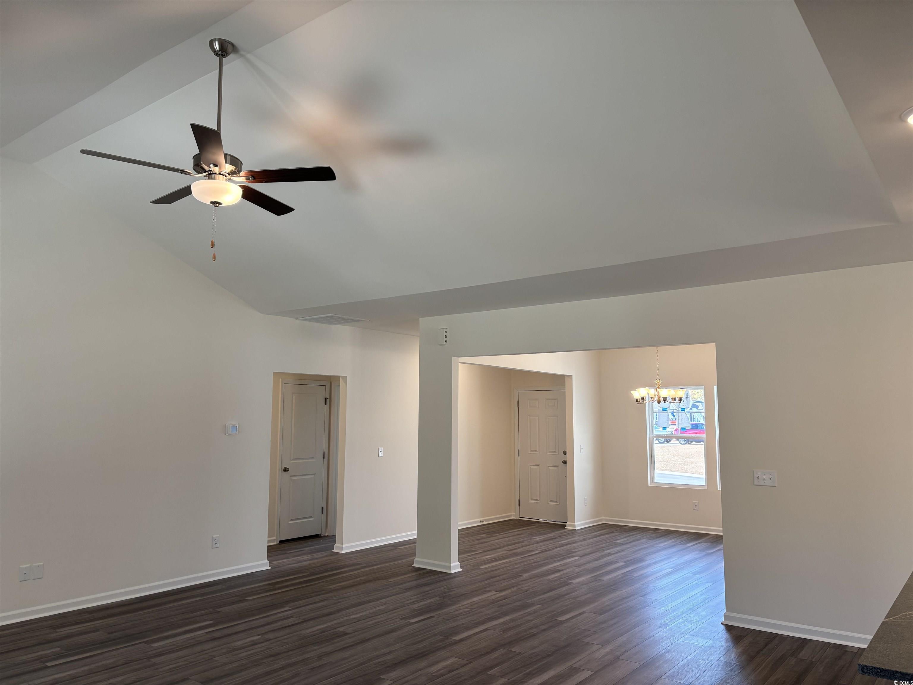 216 Palmetto Sand Loop Conway, SC 29527 - Photo 9 of 38 Unfurnished living room with ceiling fan, sink, an