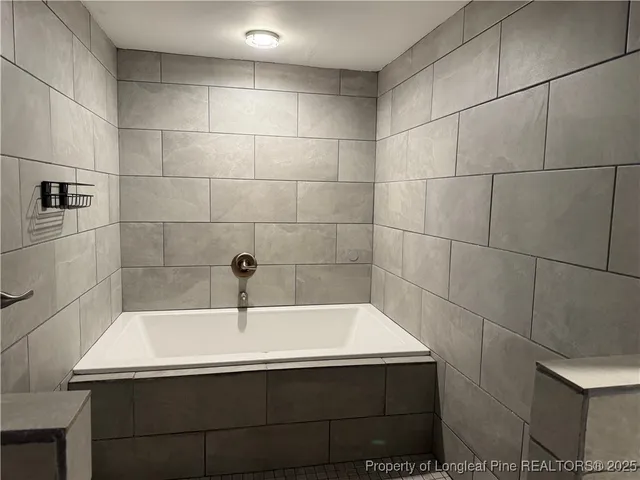 a bathroom with a bathtub