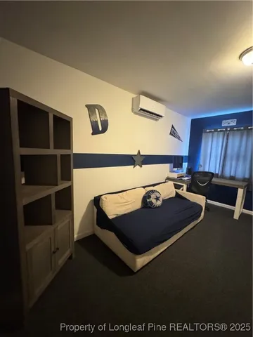 a room with furniture and window