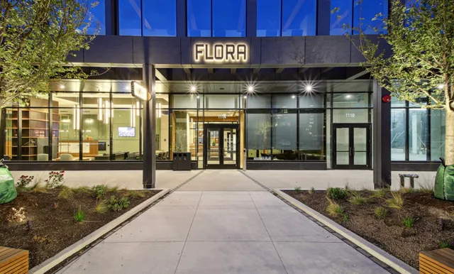 a view of a street with sitting area