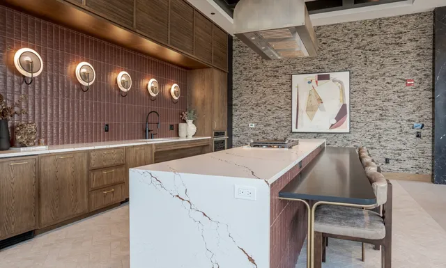 a kitchen with a sink and a stove