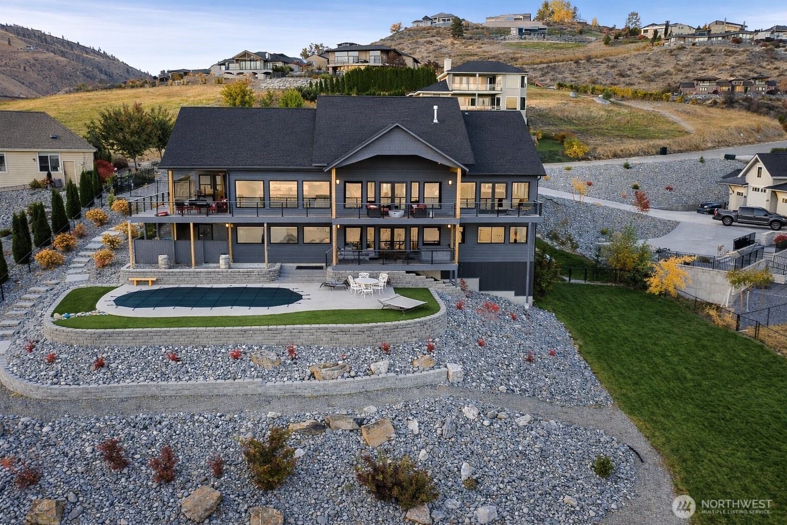 149 Clos Chevalle Road Chelan, WA 98816 - Photo 37 of 37 a front view of a house with garden
